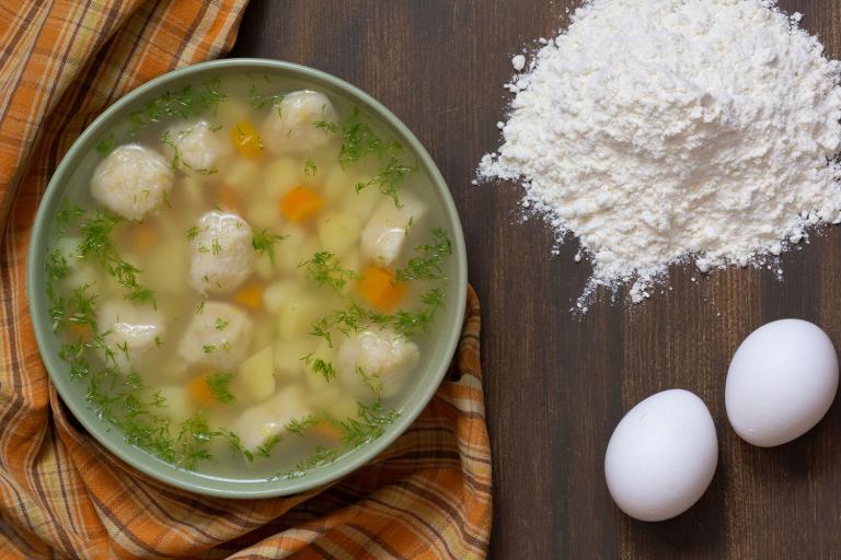 A bowl of chicken soup with home-made dumplings